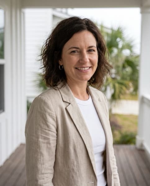 AI-generated headshot of Marisol Vane, the fictional listing agent